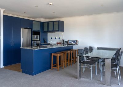 The Reef | 3 Bedroom Top Floor Beachfront Apartment | Kitchen & Dining Area